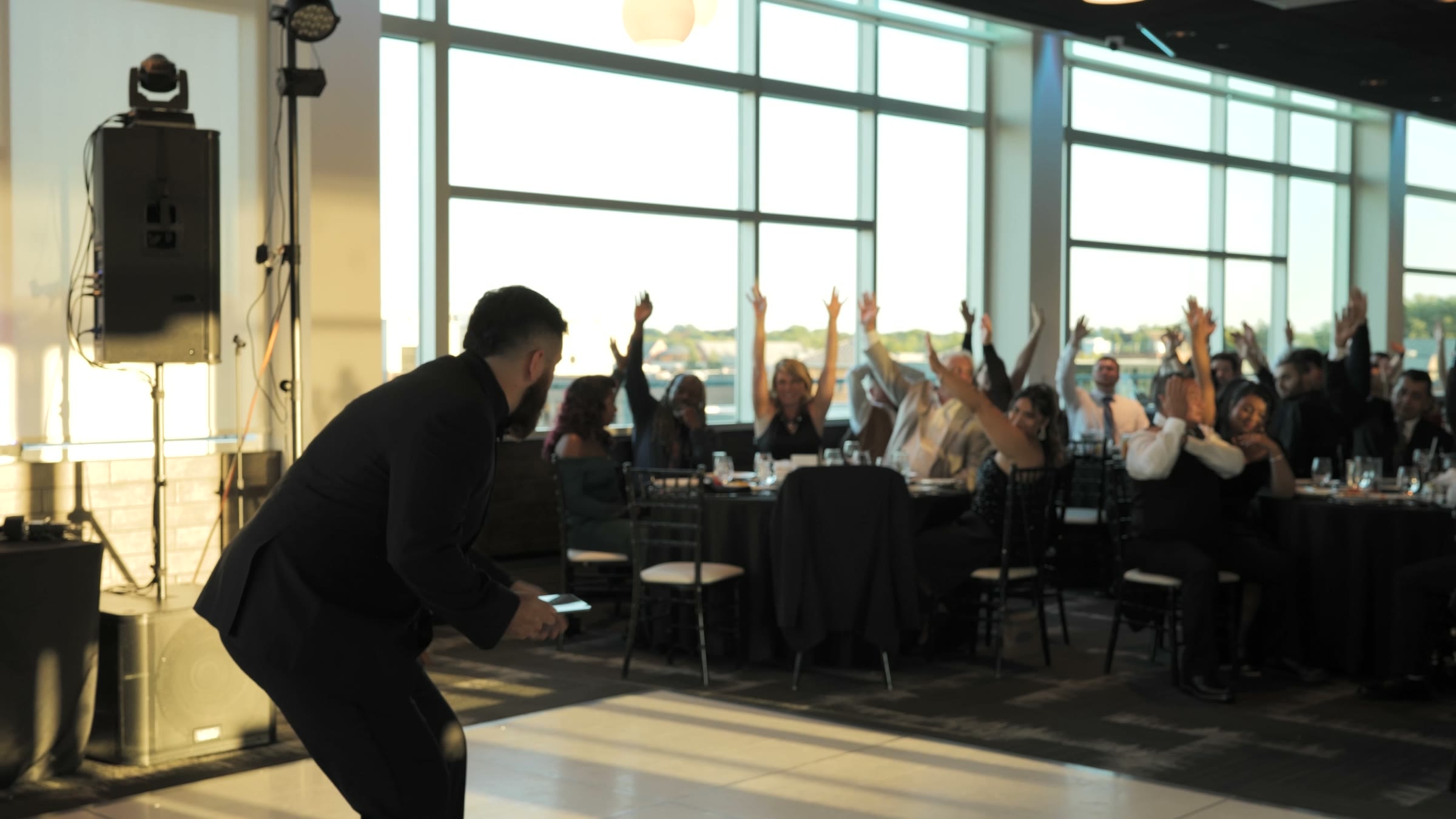 Rick facing the room at the first Guerrero Business Gala as every hand goes up
